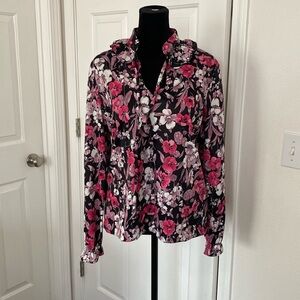 Vintage 70s long sleeve blouse with a floral print.